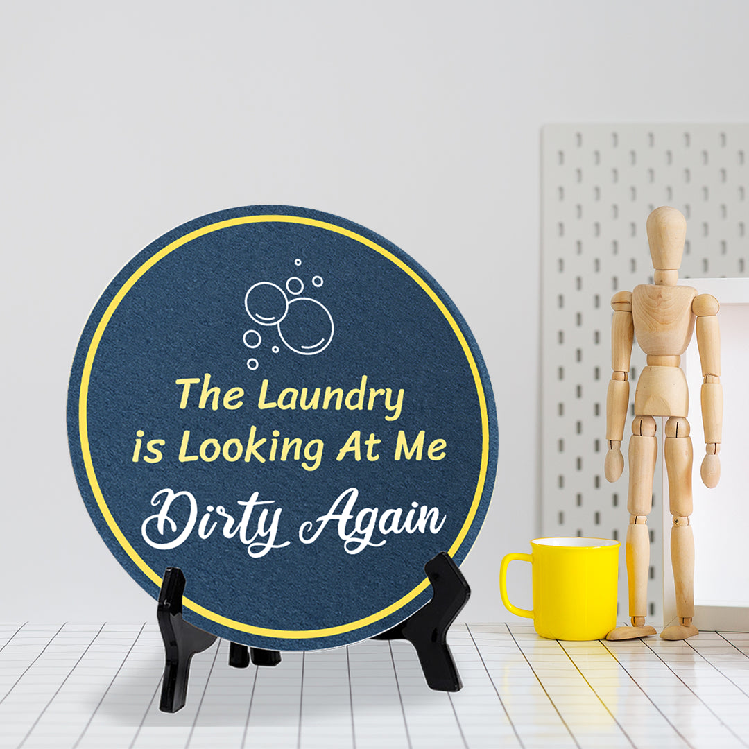 The Laundry Is Looking At Me Dirty Again (5 x 5“) Circle Table Sign with Acrylic Stand | Funny Home Decor