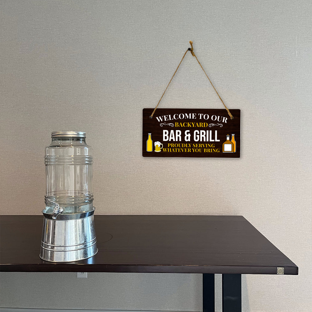 Welcome To Our Backyard Bar & Grill Proudly Serving Whatever You Bring 5x10 Hanging Plus Wall or Door Sign | Funny Home Decor