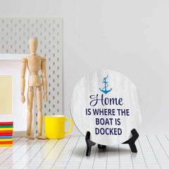 Home Is Where The Boat Is Docked (5 x 5“) Circle Table Sign with Acrylic Stand | Boats & Home Decor