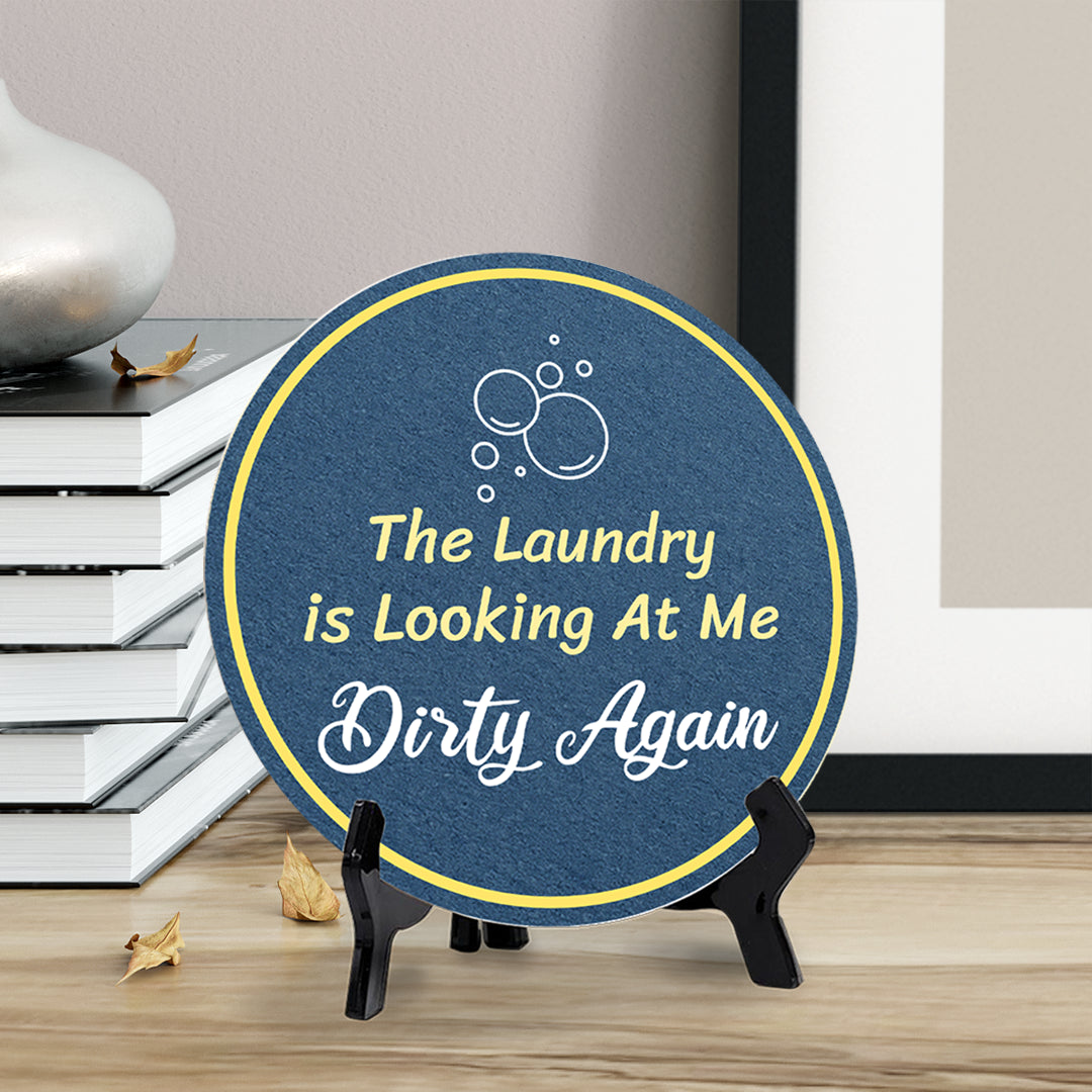 The Laundry Is Looking At Me Dirty Again (5 x 5“) Circle Table Sign with Acrylic Stand | Funny Home Decor