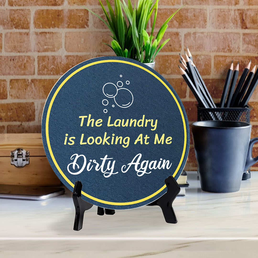 The Laundry Is Looking At Me Dirty Again (5 x 5“) Circle Table Sign with Acrylic Stand | Funny Home Decor