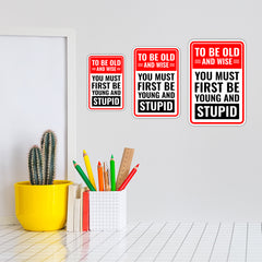 Portrait Round Plus To Be Old And Wise You Must First Be Young And Stupid Wall or Door Sign | Easy Installation | Funny Novelty Imitation Warning Signs