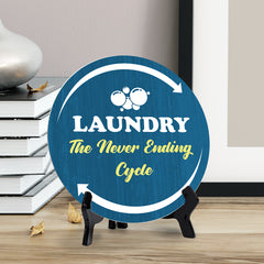 Laundry The Never Ending Cycle (5 x 5“) Circle Table Sign with Acrylic Stand | Funny Home Decor