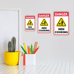 Portrait Round Plus Danger Men Cooking (BBQ) Wall or Door Sign | Easy Installation | Funny Novelty Imitation Warning Signs