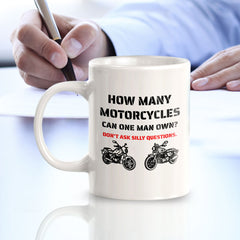 How Many Motorcycles Can One Man Own? Don't Ask Silly Questions. 11oz Plastic or Ceramic Coffee Mug | Funny Sporty Cup