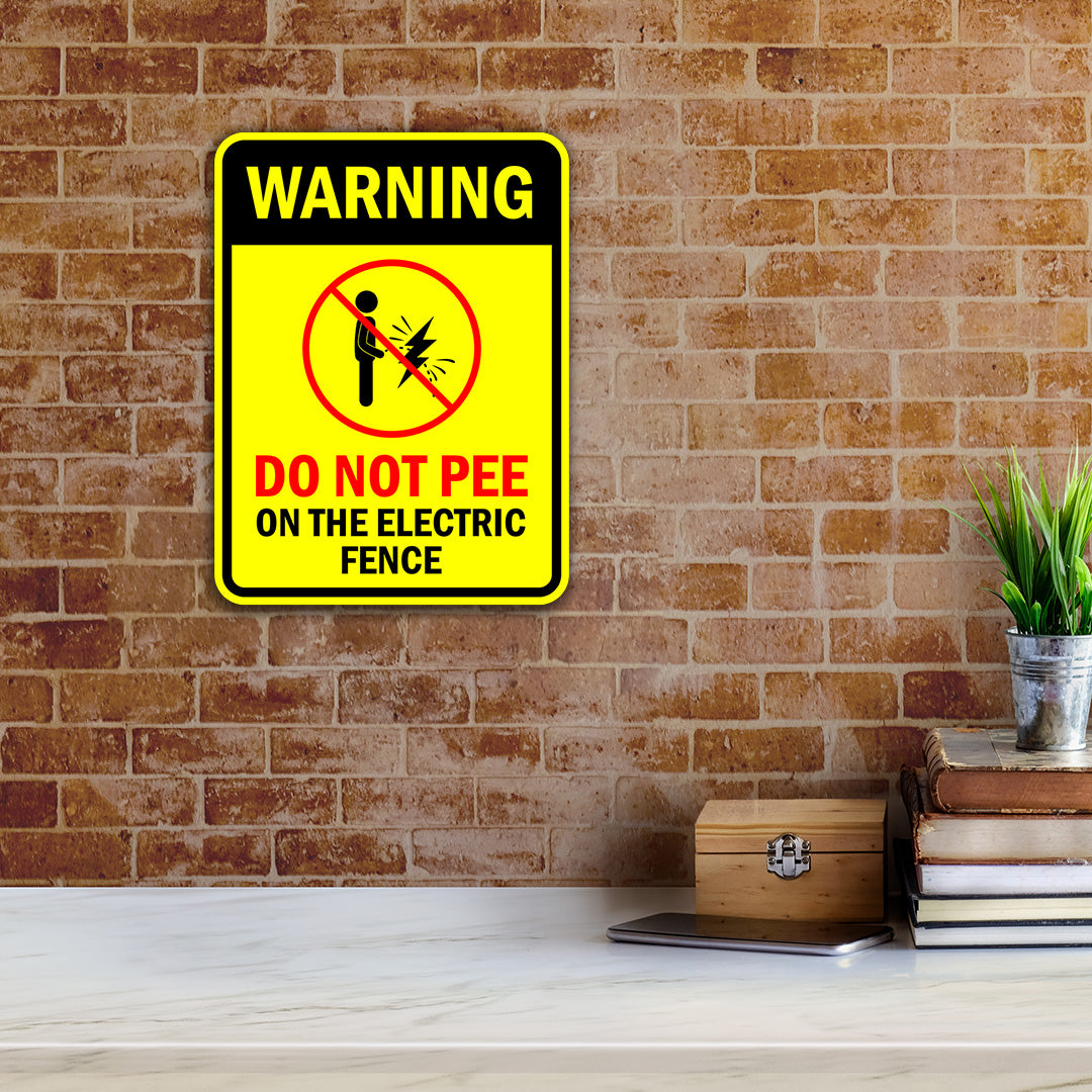 Portrait Round Plus Warning Do Not Pee On The Electric Fence Door or Wall Sign | Funny Warning Sign For Decoration